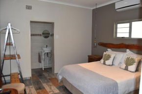 Отель Quiver Inn Guesthouse  Китмансхуп